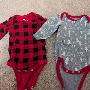 Set of two onesie, red plaid and on wilderness theme 0-3 months